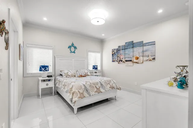 a bedroom with a bed and a cabinets