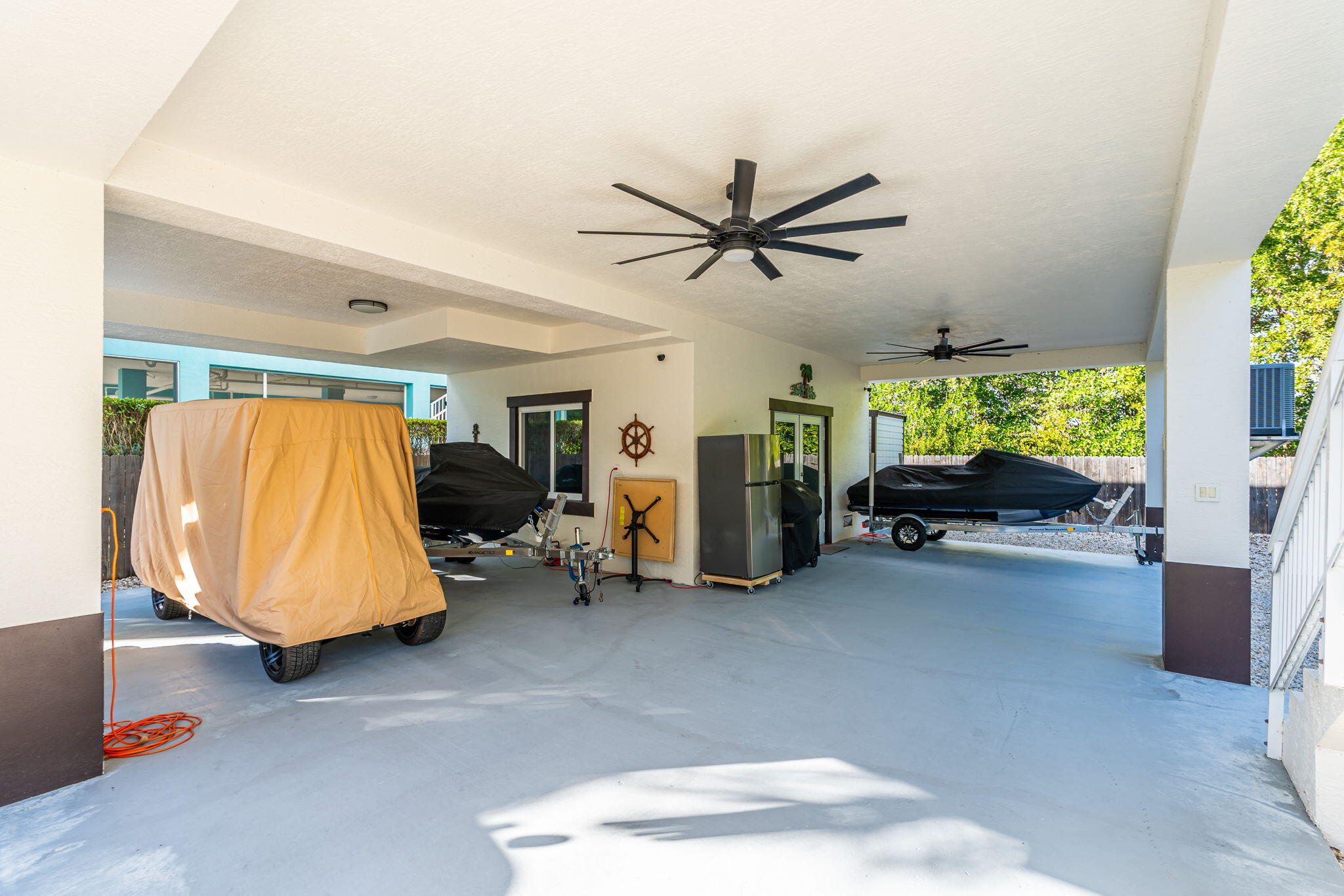 22 Tarpon Avenue Key Largo, FL 33037 - Photo 5 of 43 a living room with furniture and a flat screen tv