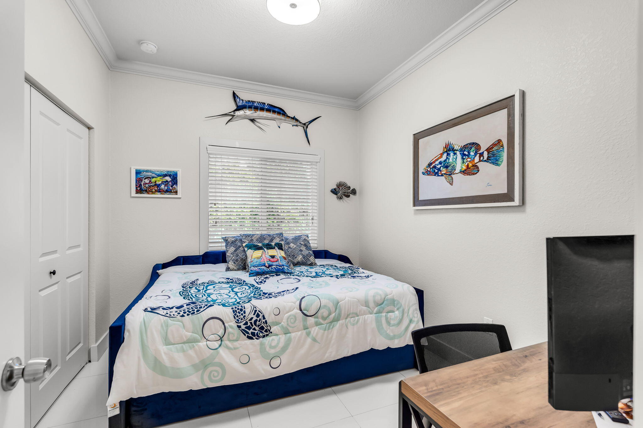 22 Tarpon Avenue Key Largo, FL 33037 - Photo 8 of 43 a bedroom with a bed and wooden floor