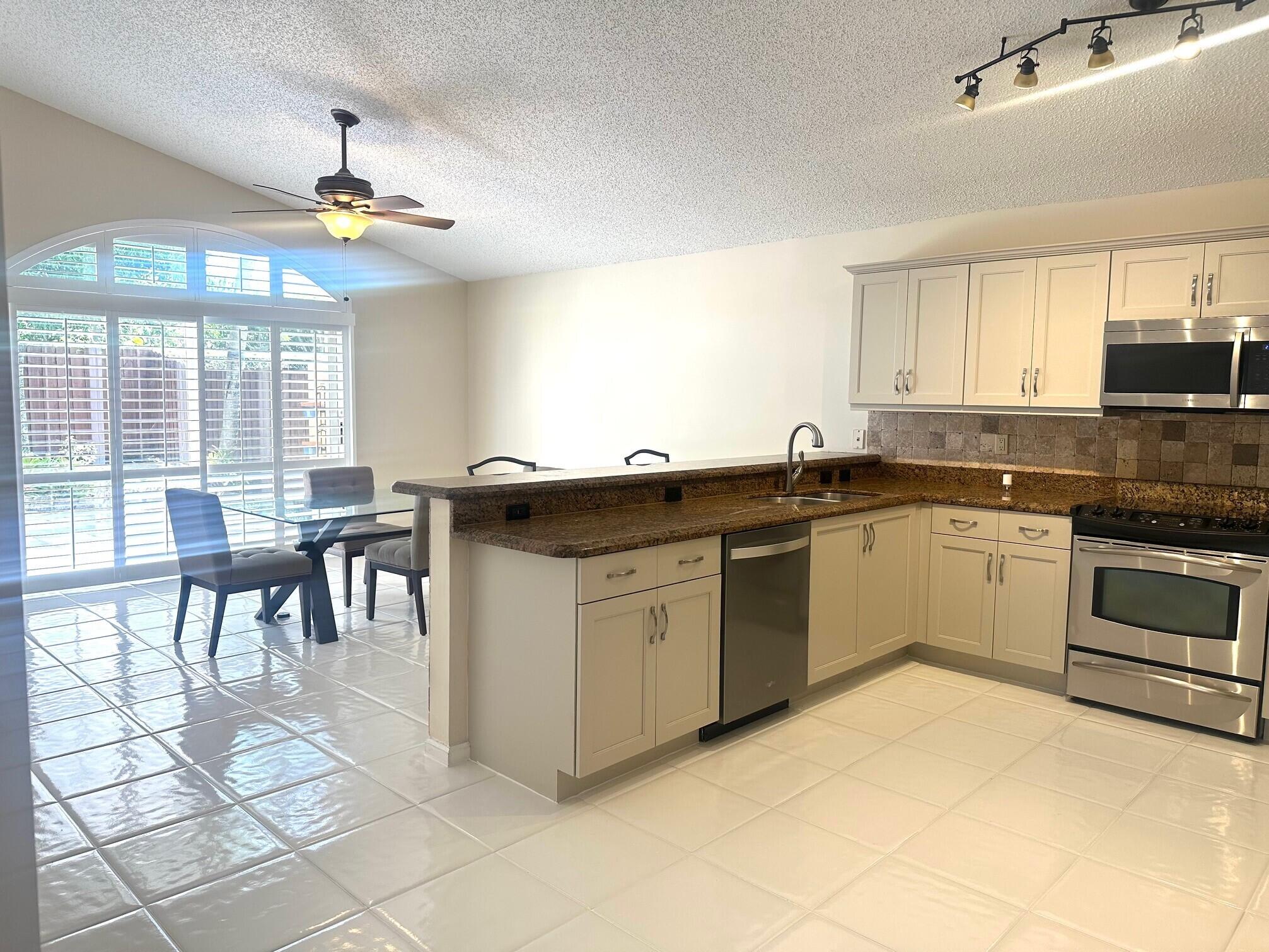9530 Fox Trot Lane Boca Raton, FL 33496 - Photo 17 of 45 kitchenb