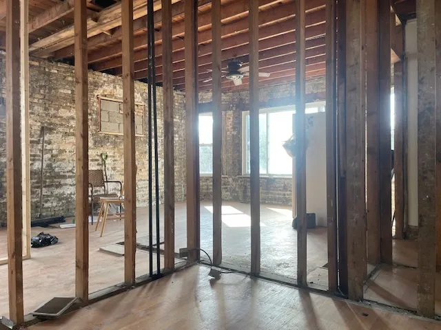 a view of a glass door and windows