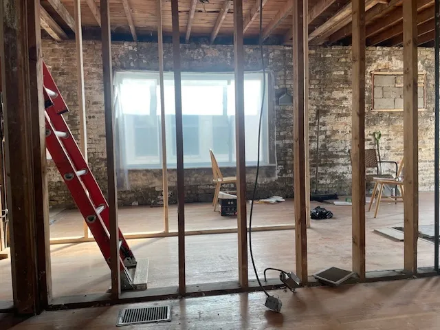 a room with glass door and windows