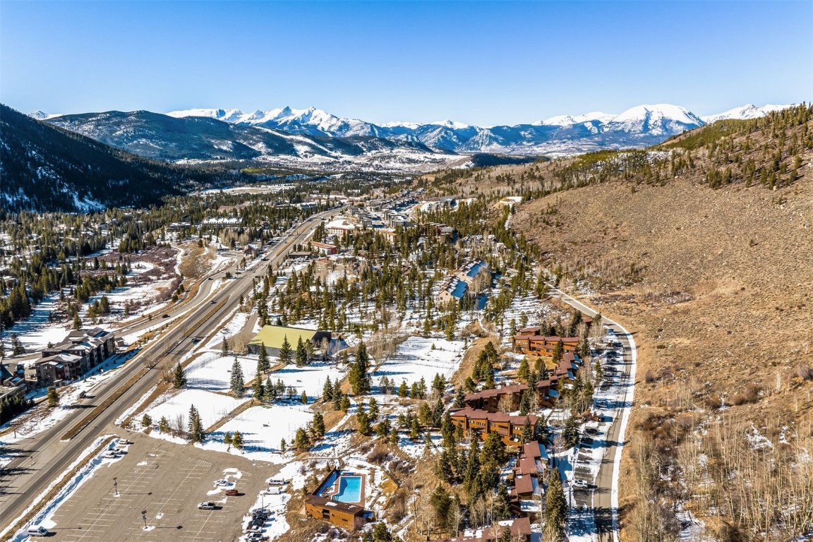 410 Tennis Club Road, Unit 1317 Keystone, CO 80435 - Photo 23 of 47 Snowy aerial view with a mountain view
