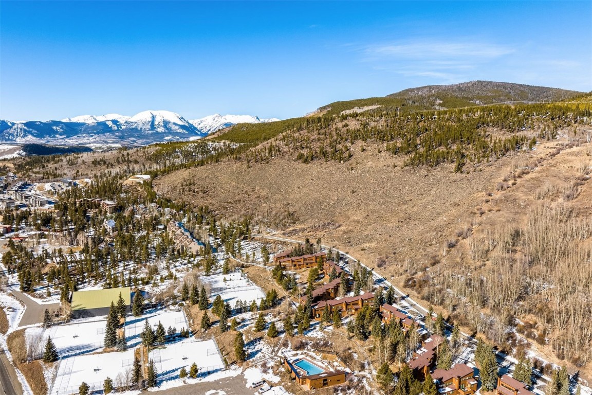 410 Tennis Club Road, Unit 1317 Keystone, CO 80435 - Photo 37 of 47 Aerial view of residential area featuring a mountainous background