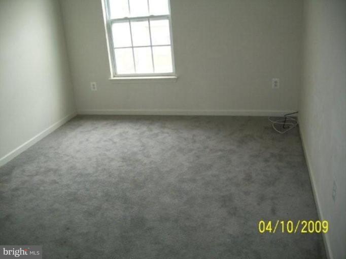 841 Middle River Road Middle River, MD 21220 - Photo 5 of 9 an empty room with a window