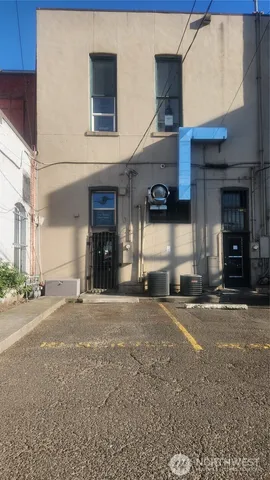 a front view of a building with garage