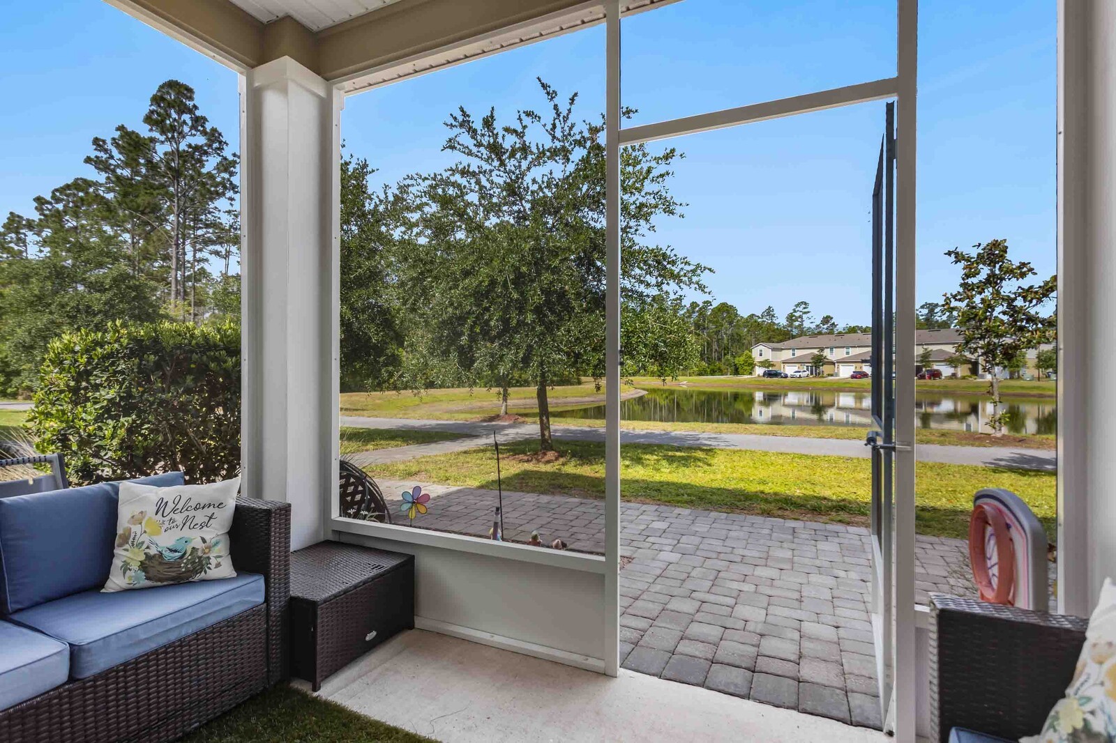86784 Mainline Road Yulee, FL 32097 - Photo 19 of 25 a view of a swimming pool with a lounge chairs