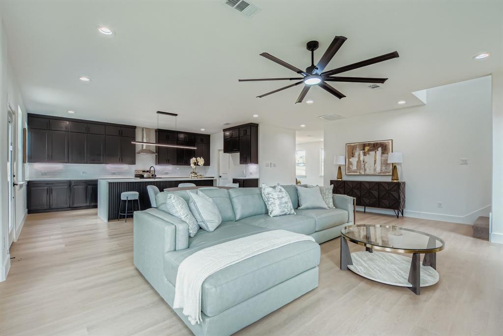 12 Climbing Tree Drive Kaufman, TX 75142 - Photo 12 of 28 a living room with furniture and kitchen view