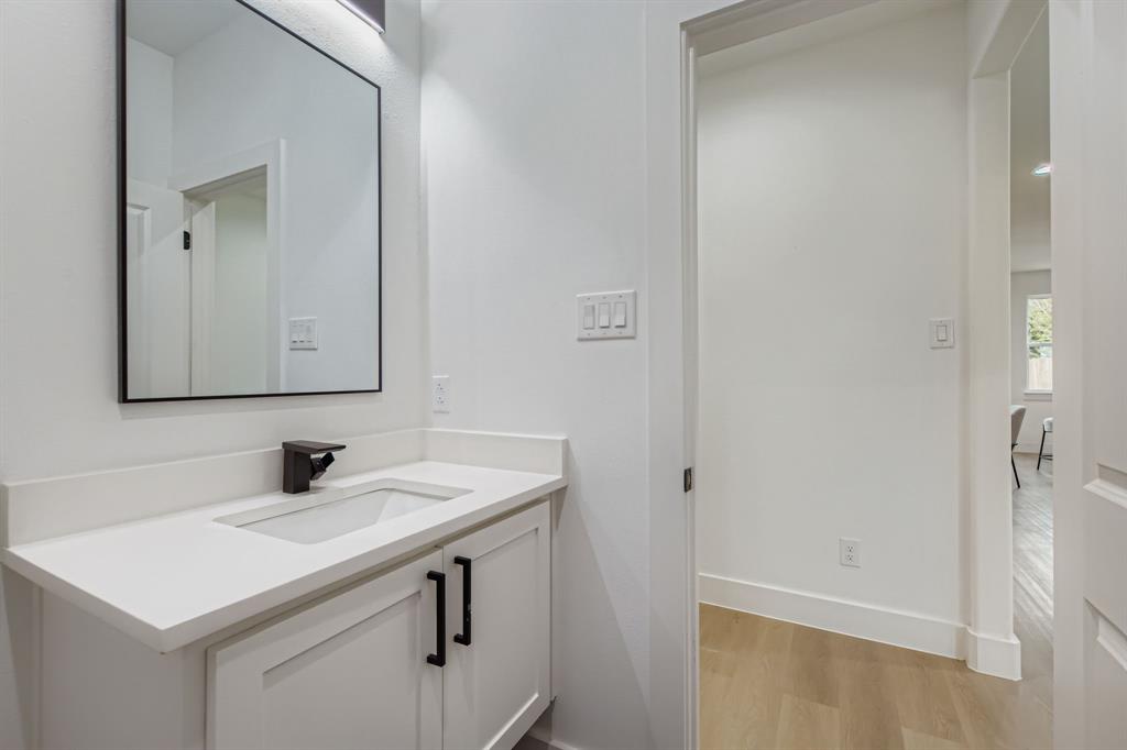 12 Climbing Tree Drive Kaufman, TX 75142 - Photo 13 of 28 a bathroom with a sink and a mirror