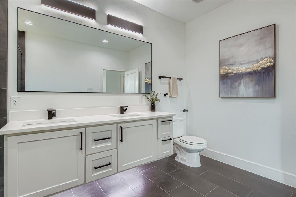 12 Climbing Tree Drive Kaufman, TX 75142 - Photo 17 of 28 a bathroom with a toilet sink and mirror
