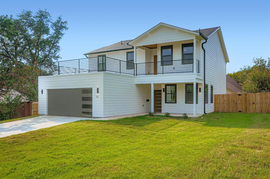 12 Climbing Tree Drive Kaufman, TX 75142 - Photo 2 of 28 a front view of a house with a yard and garage