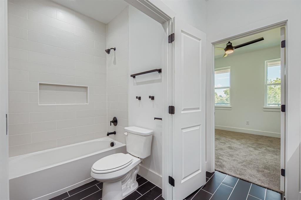 12 Climbing Tree Drive Kaufman, TX 75142 - Photo 23 of 28 a bathroom with a toilet sink and shower