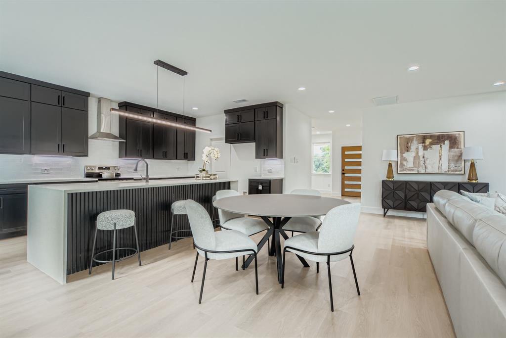 12 Climbing Tree Drive Kaufman, TX 75142 - Photo 6 of 28 a dining room with furniture a window and a flat screen tv