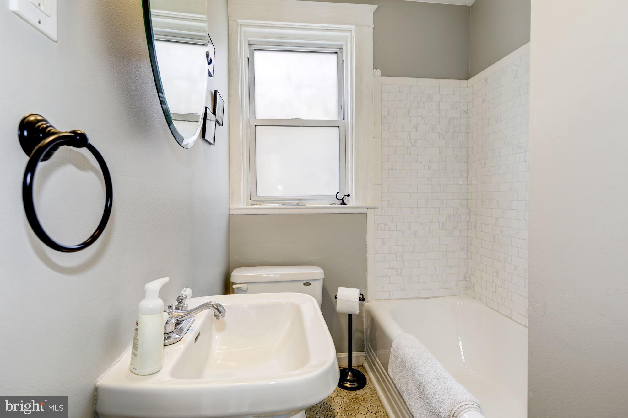 639 Murdock Road Baltimore, MD 21212 - Photo 23 of 41 Renovated hall bath. Tub reglazed. New tile.