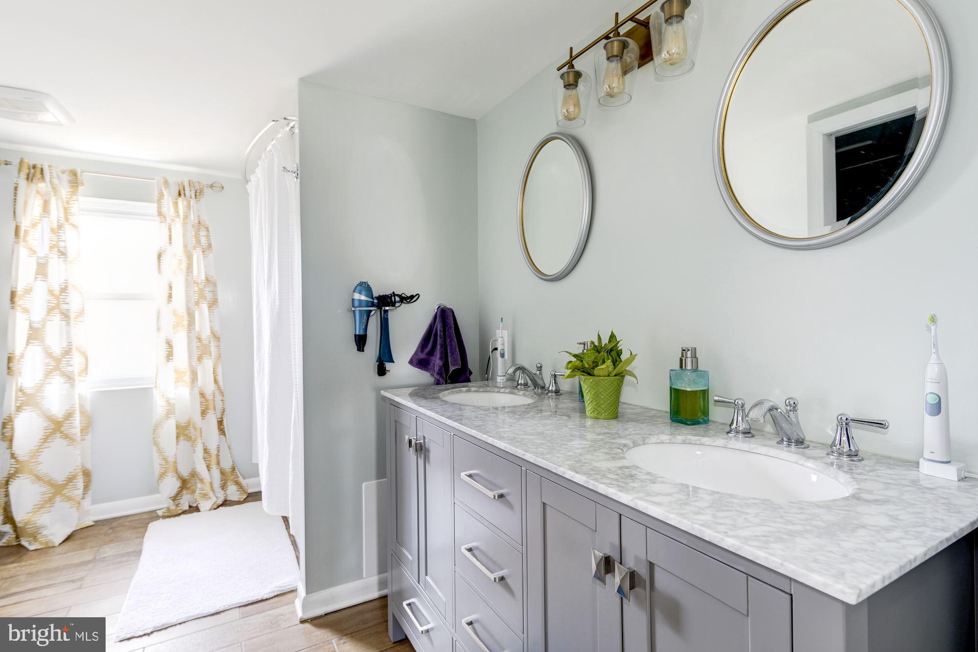639 Murdock Road Baltimore, MD 21212 - Photo 27 of 41 Gorgeous new master bath with double sinks.