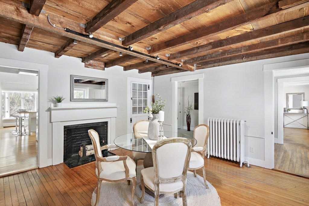 206 West Street Reading, MA 01867 - Photo 11 of 28 a living room with furniture and a fireplace