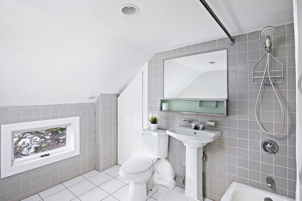 206 West Street Reading, MA 01867 - Photo 17 of 28 a bathroom with a sink toilet and shower