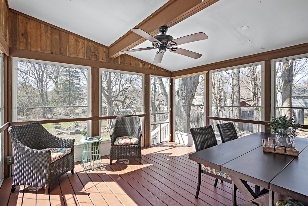206 West Street Reading, MA 01867 - Photo 19 of 28 a view of a dining room with furniture window and outside view