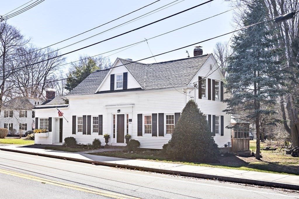206 West Street Reading, MA 01867 - Photo 24 of 28 a view of a white building among the street