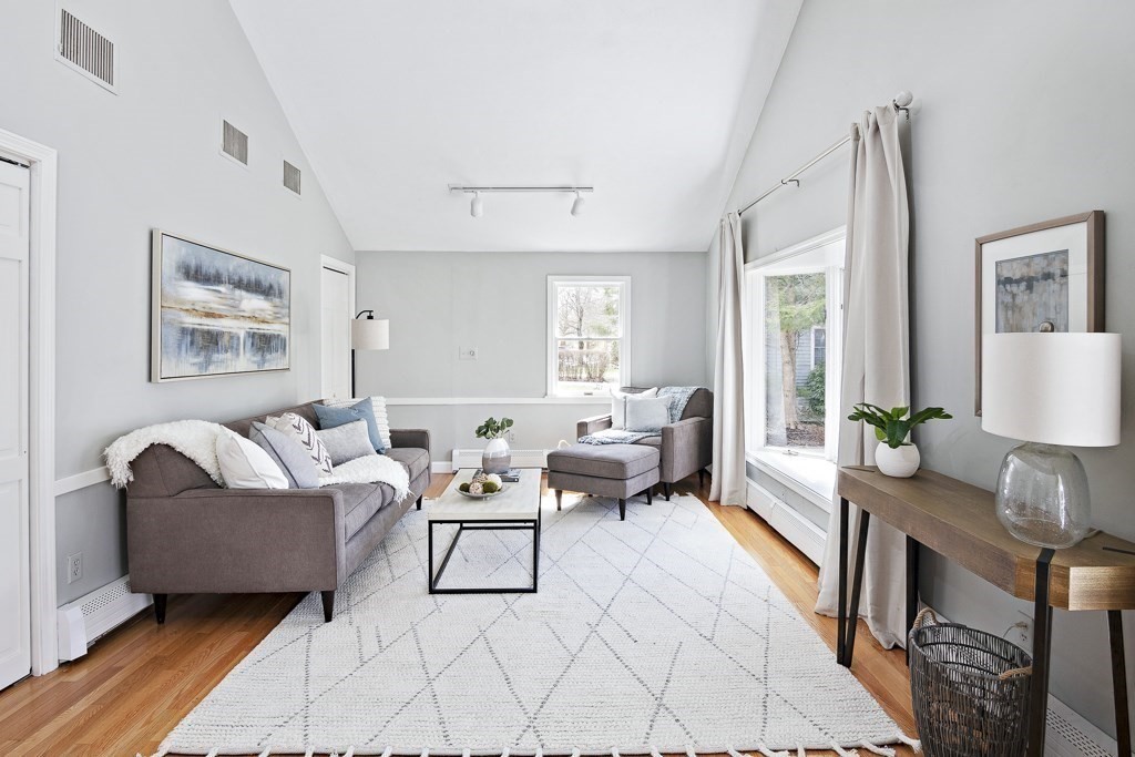 206 West Street Reading, MA 01867 - Photo 6 of 28 a living room with furniture and a large window