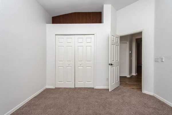an empty room with closet