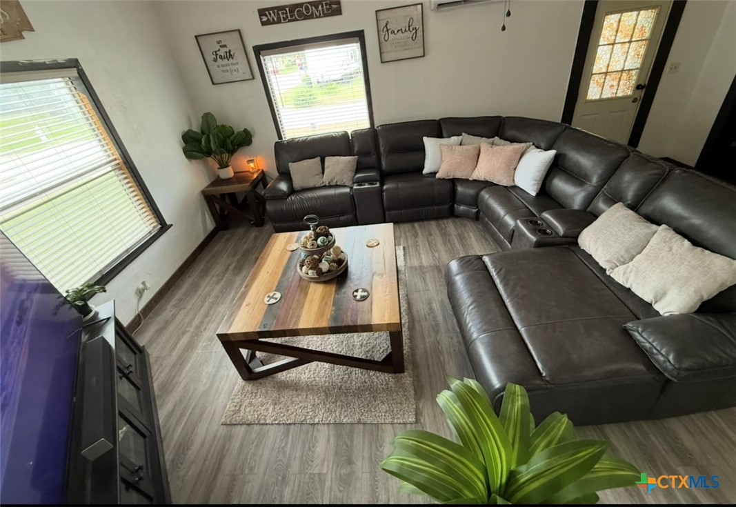 202 Clark Street Yoakum, TX 77995 - Photo 3 of 15 a living room with furniture