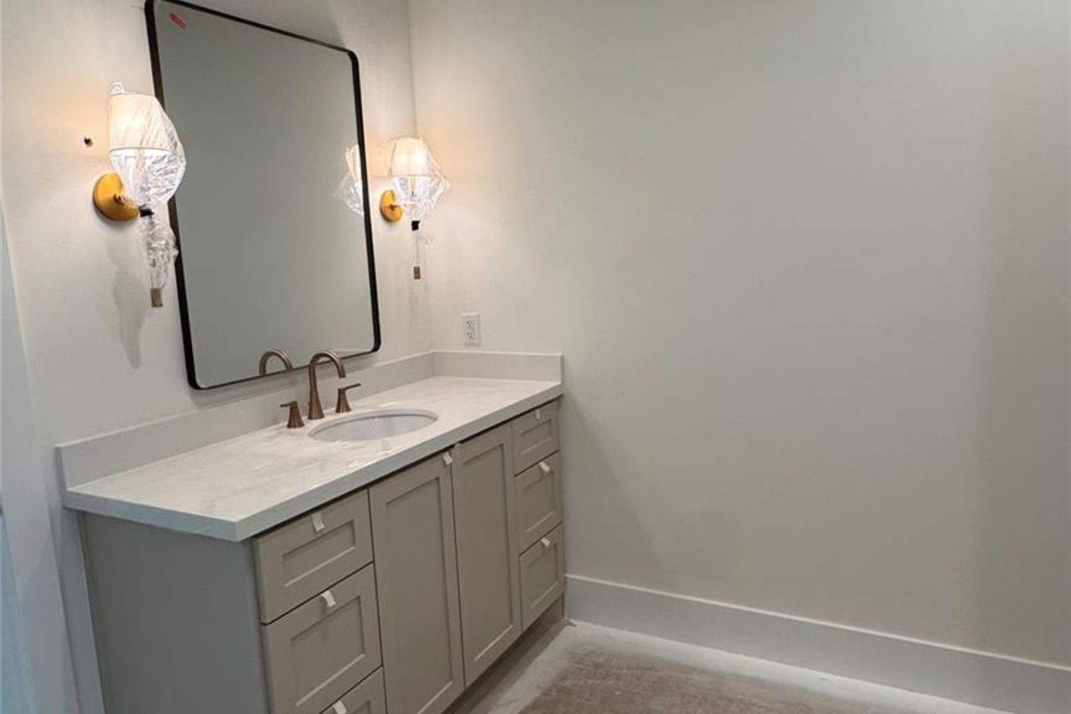 65 Shadow Creek Ridge Drive Spring, TX 77389 - Photo 18 of 44 a bathroom with a sink and a mirror