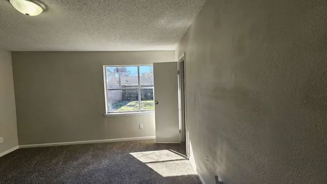 an empty room with windows