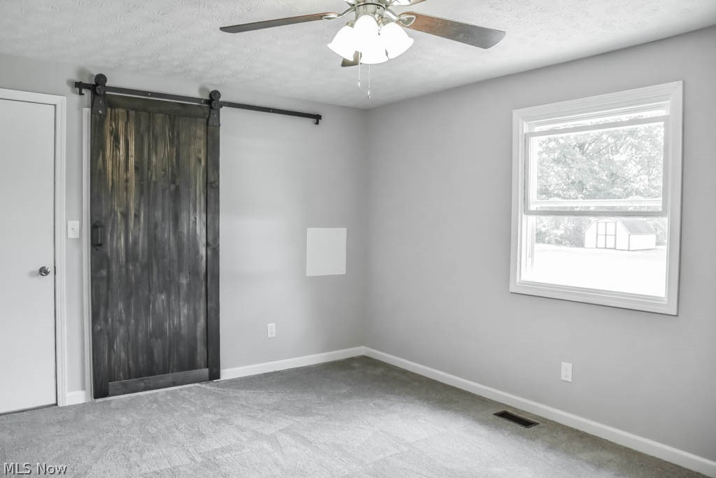 4899 Hattrick Road Ravenna, OH 44266 - Photo 13 of 20 The master has a sliding door to the private full bath.