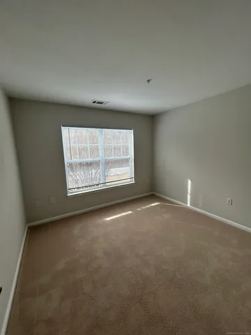 an empty room with closet