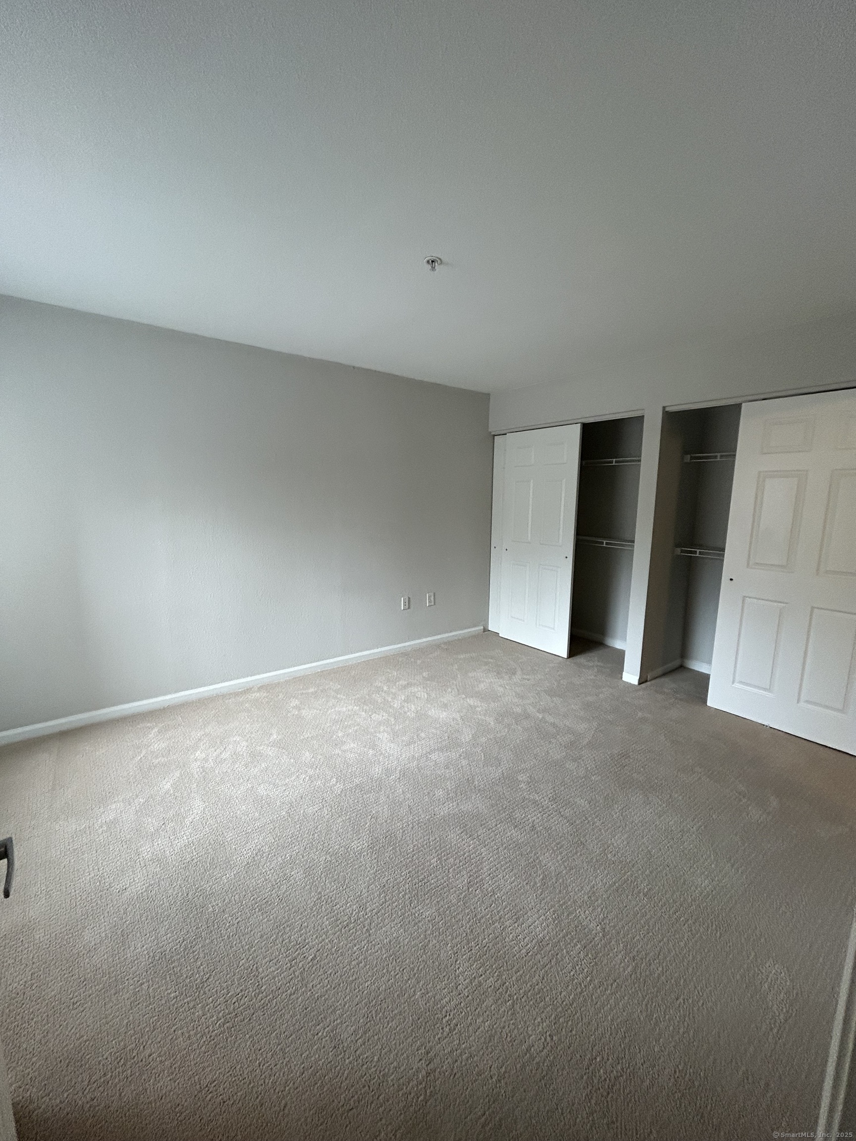 138 Hollow Tree Ridge Road, Unit 1802 Darien, CT 06820 - Photo 13 of 30 a view of empty room