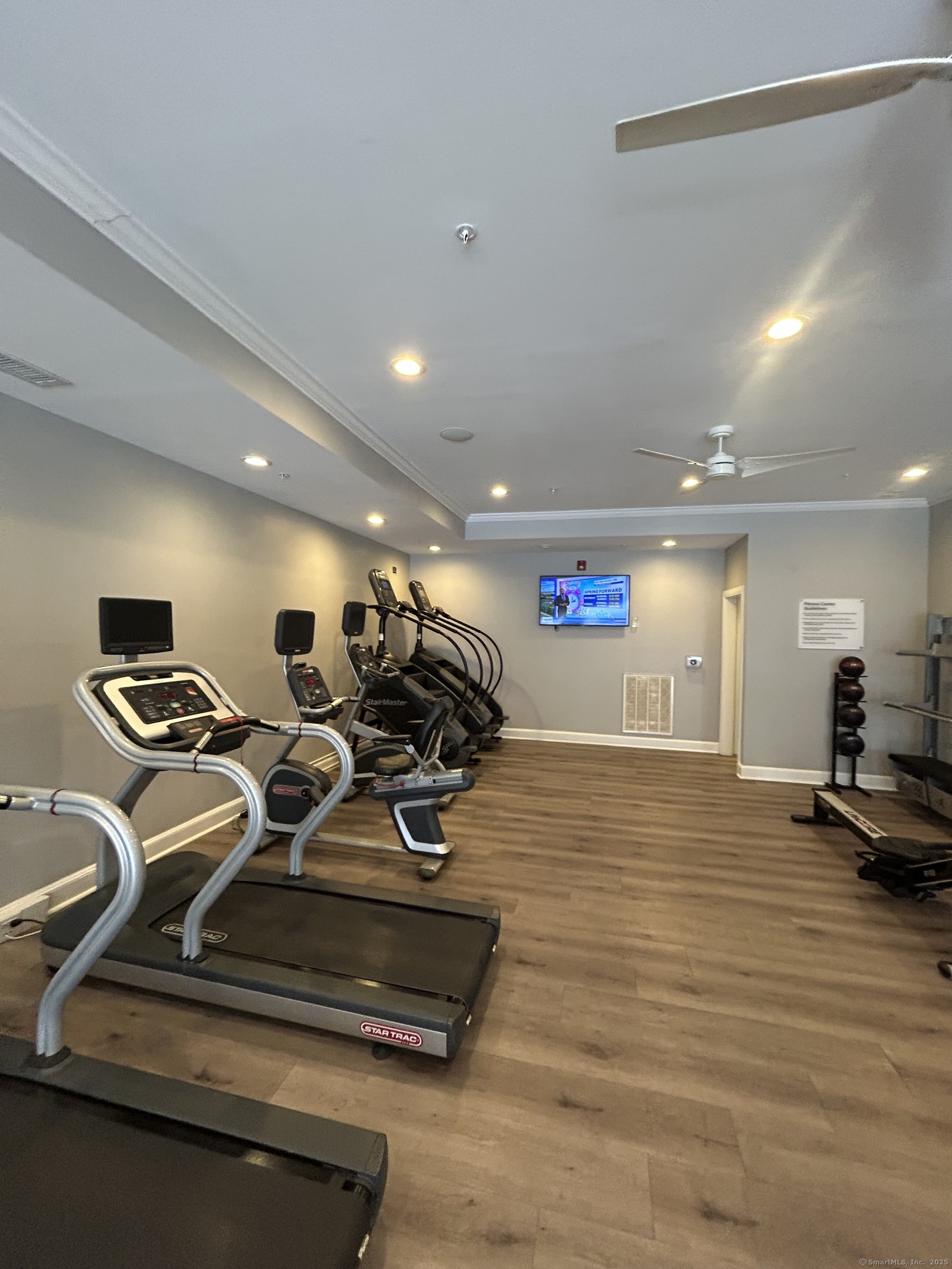 138 Hollow Tree Ridge Road, Unit 1802 Darien, CT 06820 - Photo 17 of 30 a view of a room with gym equipment