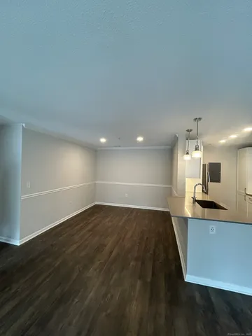 a view of a kitchen with a sink