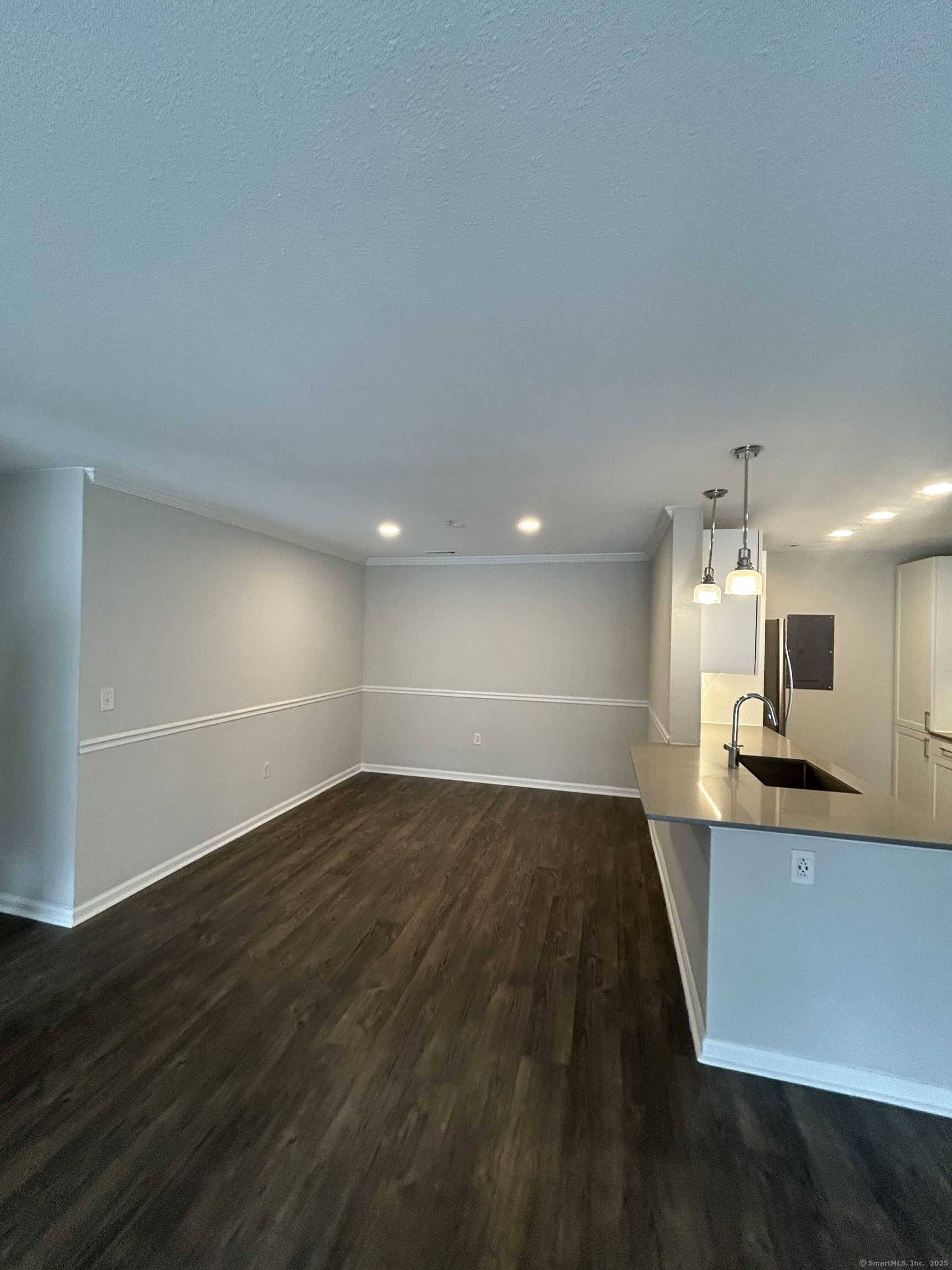 138 Hollow Tree Ridge Road, Unit 1802 Darien, CT 06820 - Photo 2 of 30 a view of a kitchen with a sink