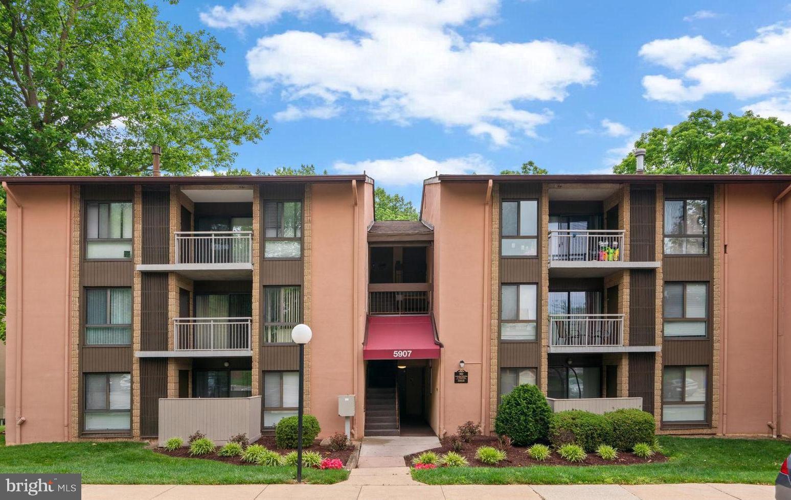 a front view of multi story residential apartment building