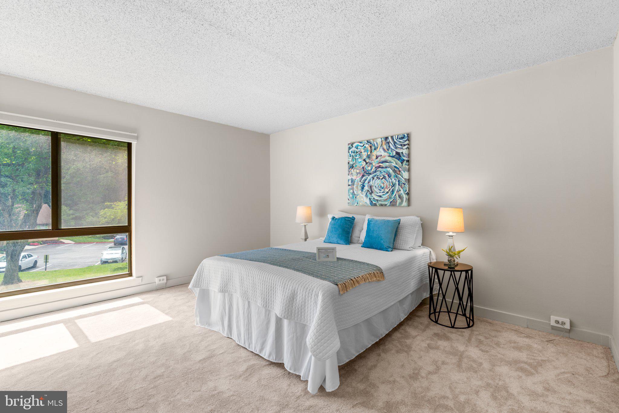 5907 Tamar Drive, Unit 7 R7 Columbia, MD 21045 - Photo 11 of 23 a bedroom with a bed and a window