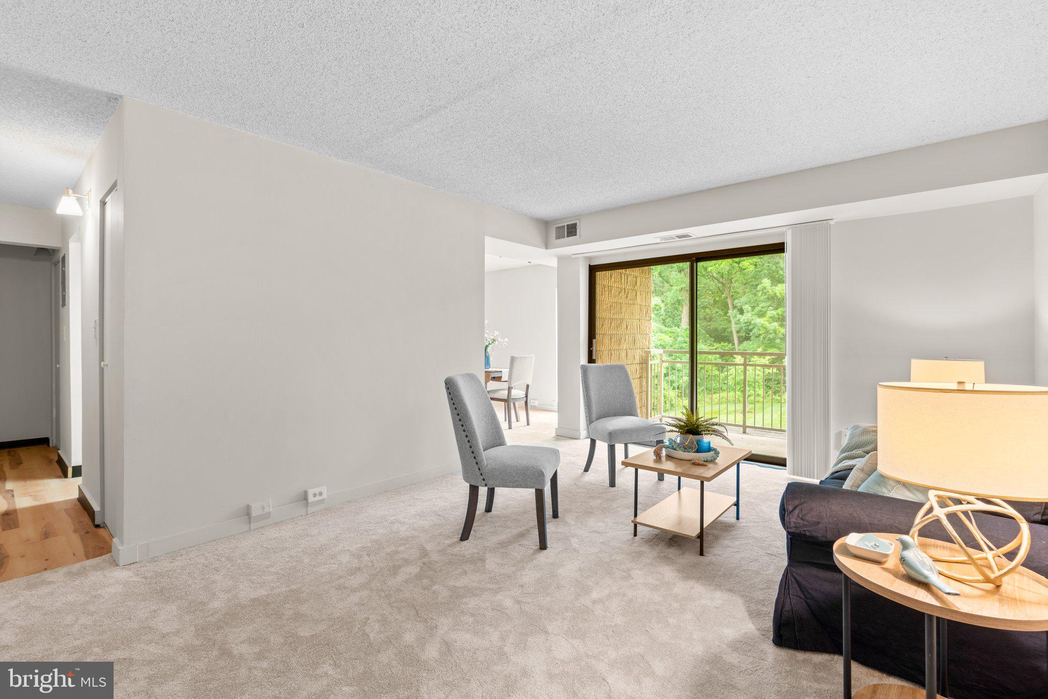 5907 Tamar Drive, Unit 7 R7 Columbia, MD 21045 - Photo 2 of 23 a living room with furniture and a window