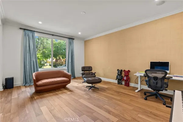 a room with furniture and a wooden floor