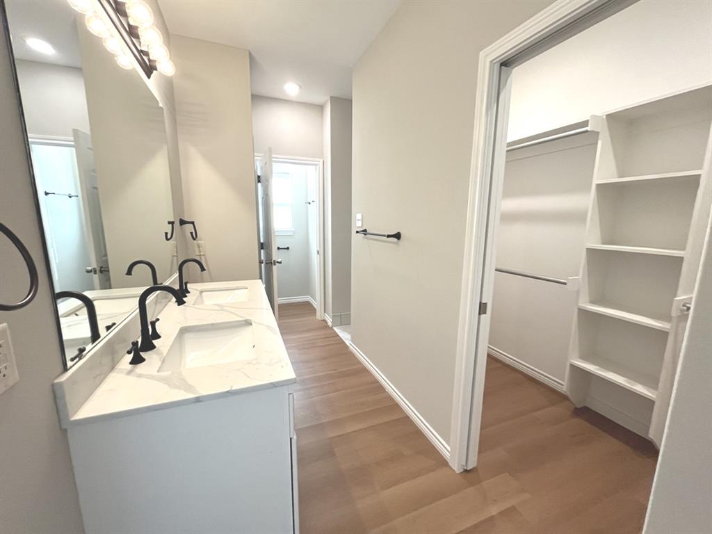 316 James Street Mabank, TX 75147 - Photo 16 of 20 a bathroom with a sink and a mirror