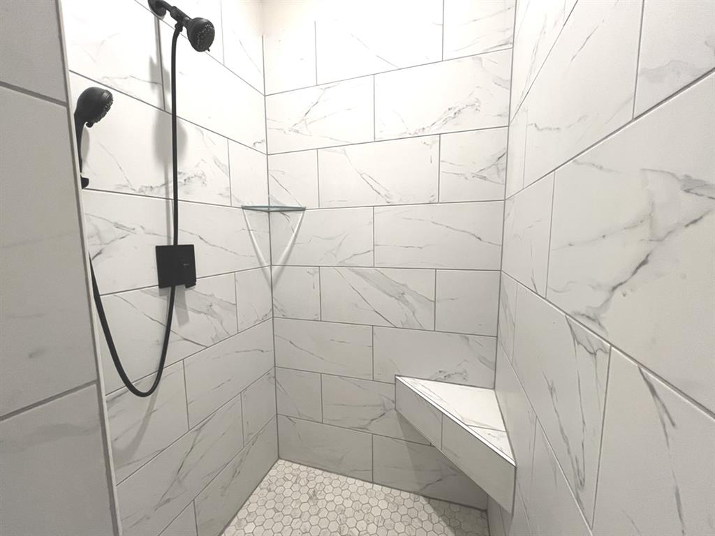 316 James Street Mabank, TX 75147 - Photo 17 of 20 a bathroom with a shower
