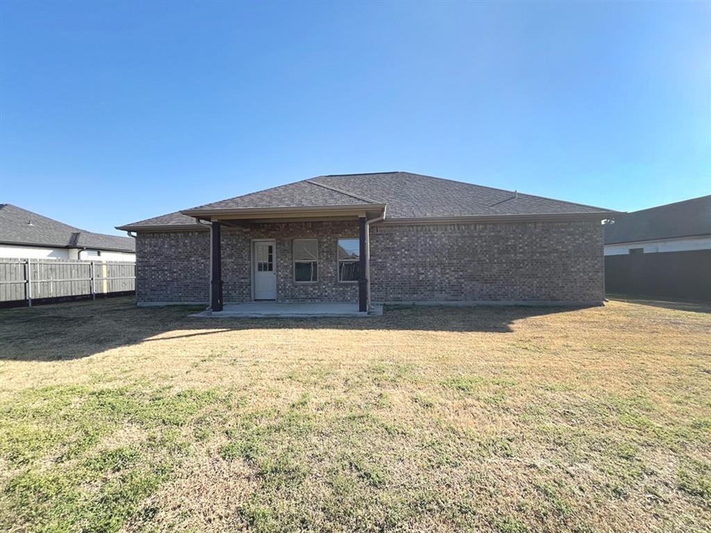 316 James Street Mabank, TX 75147 - Photo 20 of 20 a front view of a house with a yard