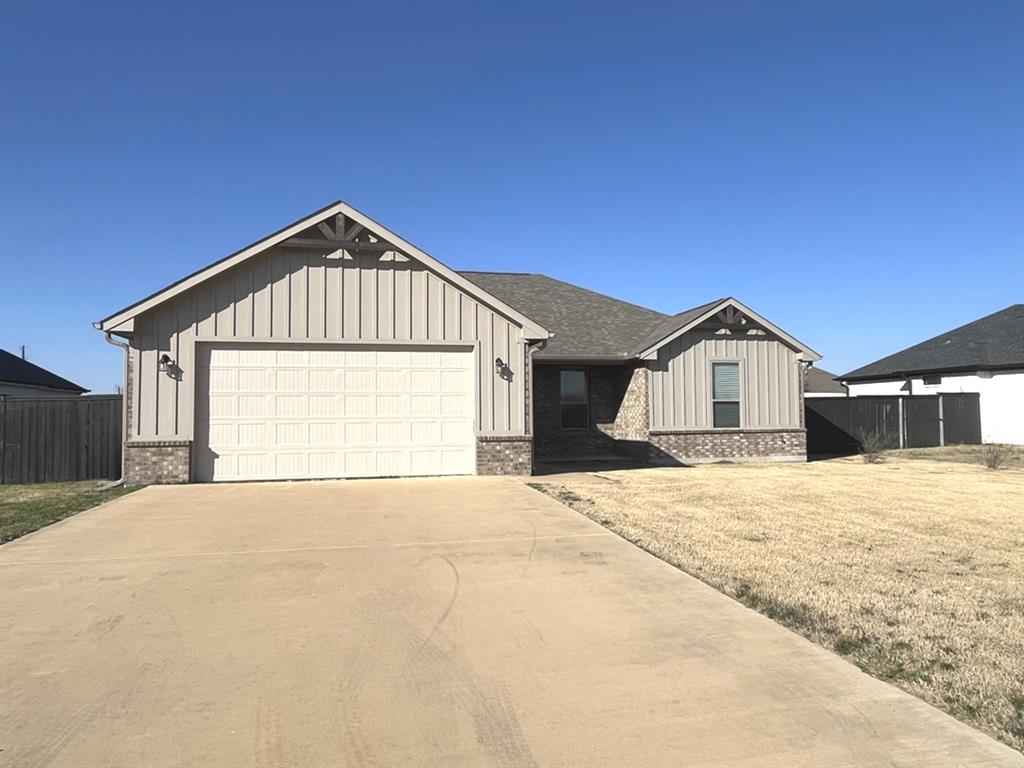 316 James Street Mabank, TX 75147 - Photo 2 of 20 a front view of a house with a yard