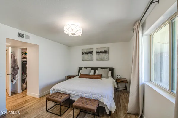 a view of a backyard with potted plants