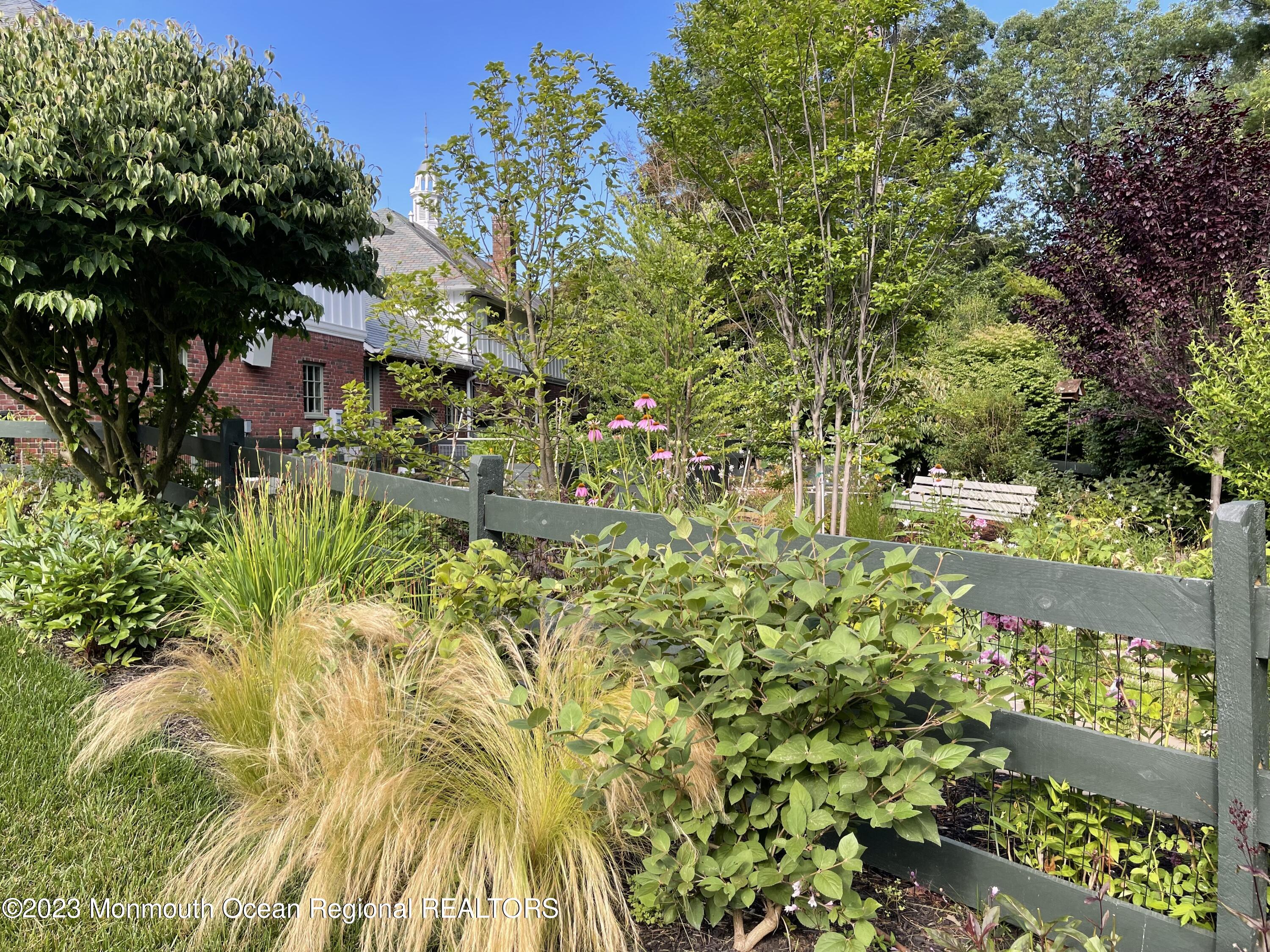 183 Chapel Hill Road Red Bank, NJ 07701 - Photo 54 of 77 a backyard of a house with lots of green space