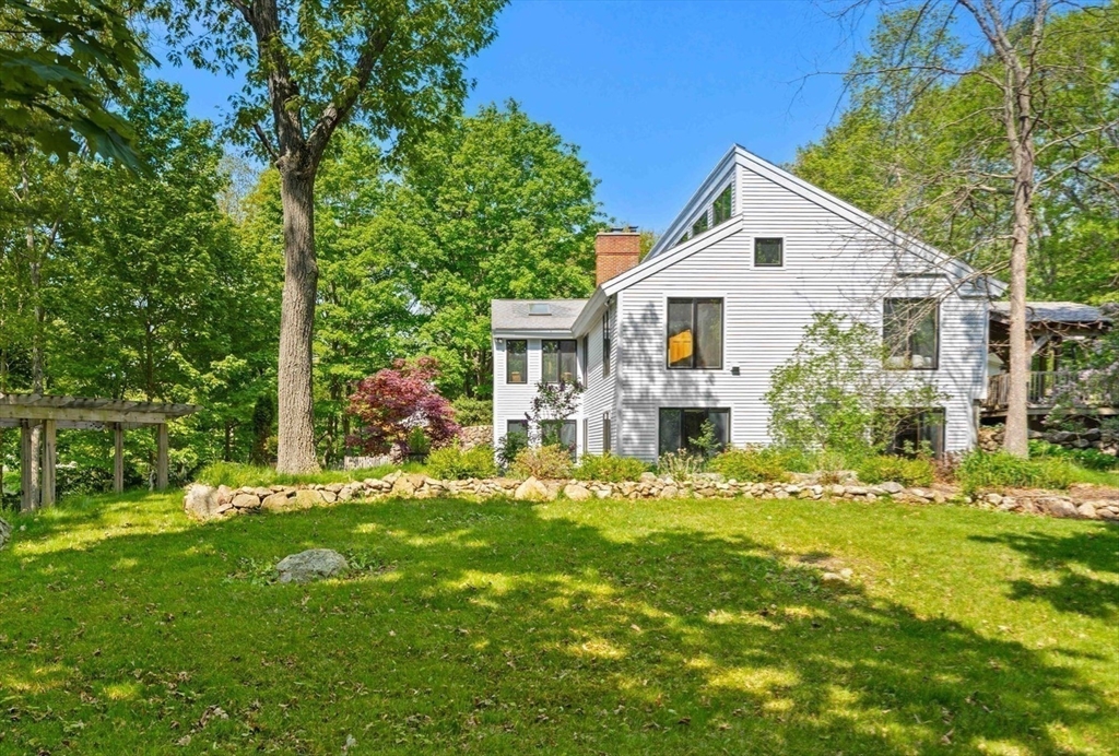3 Whitman Place Beverly, MA 01915 - Photo 28 of 34 a front view of house with yard