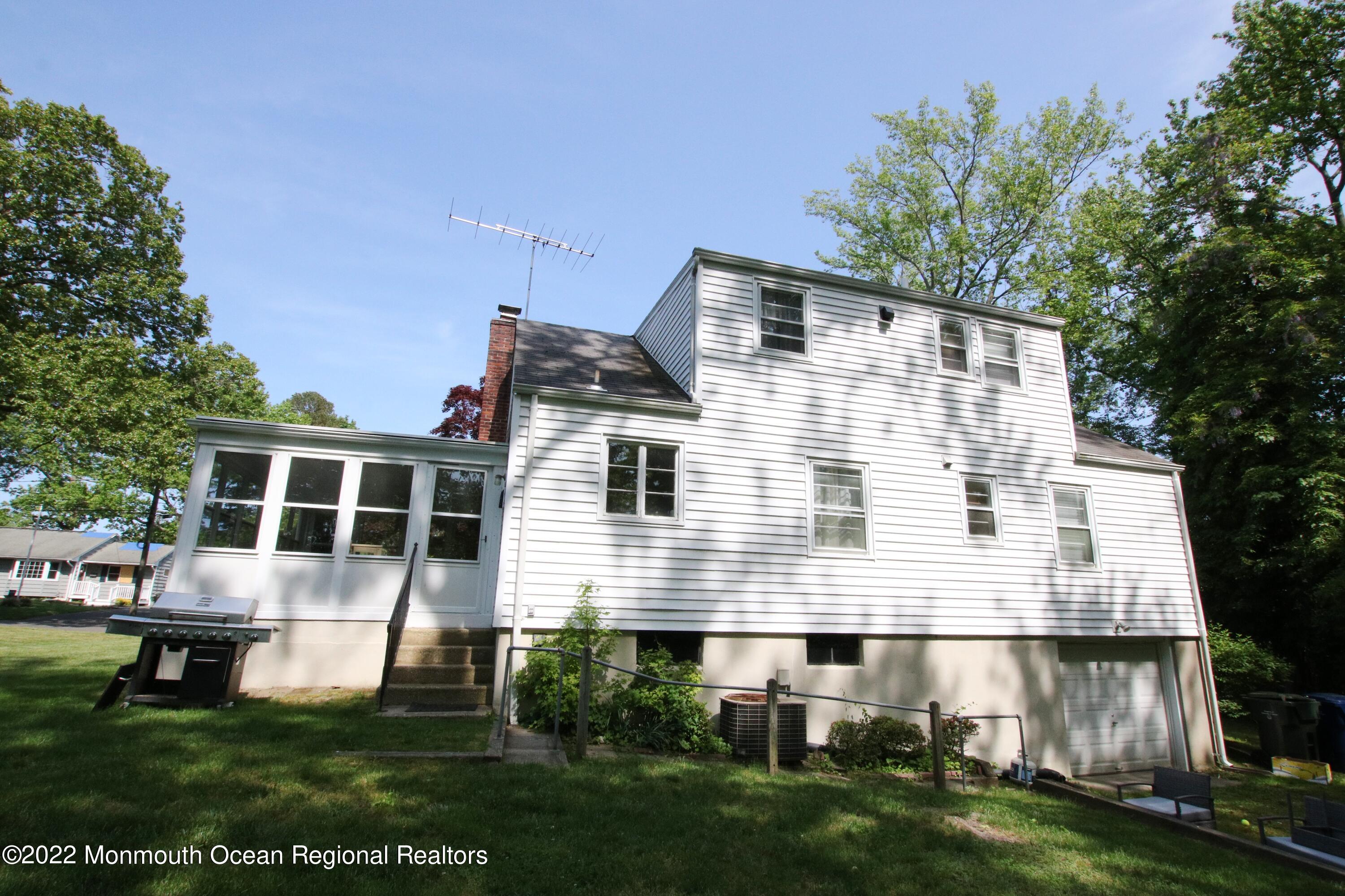 242 Pinecrest Road Oakhurst, NJ 07755 - Photo 21 of 23 Rear Exterior