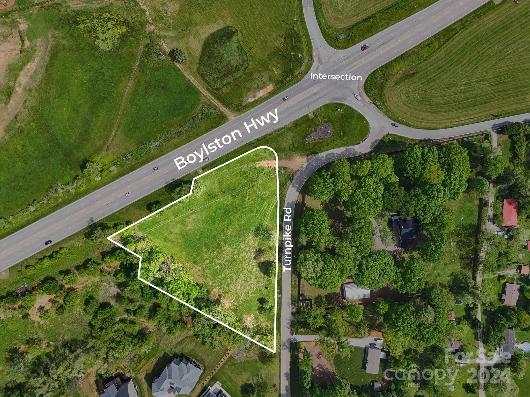 320 Turnpike Road Mills River, NC 28759 - Photo 1 of 5 a view of a swimming pool with a yard