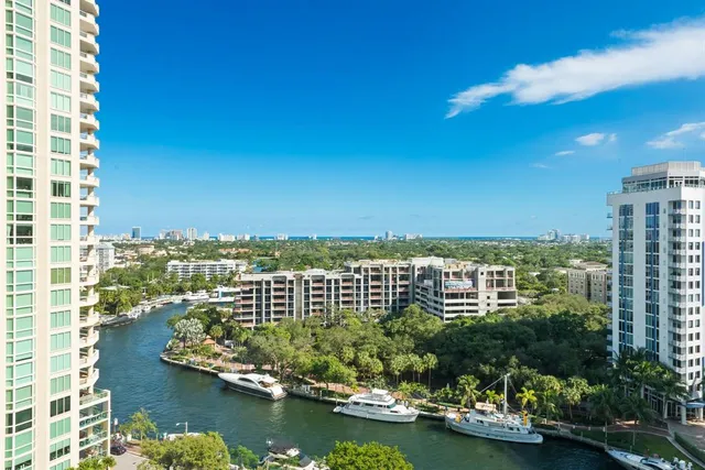 a kitchen with a white cabinets and white appliances
