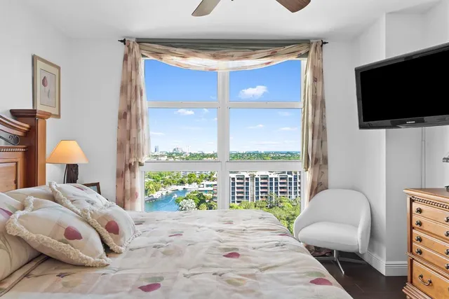 a view of a wooden house with a small pool