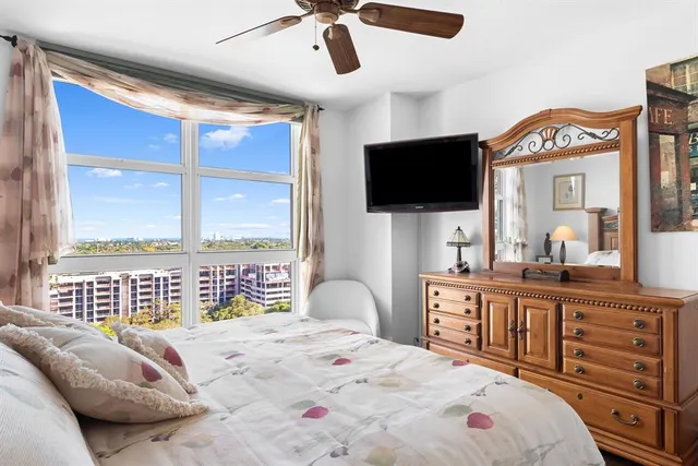a living room with a couch and a flat screen tv